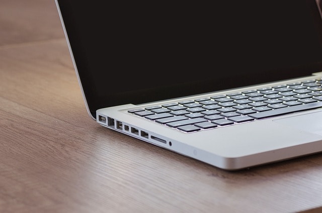 A laptop on the desk.