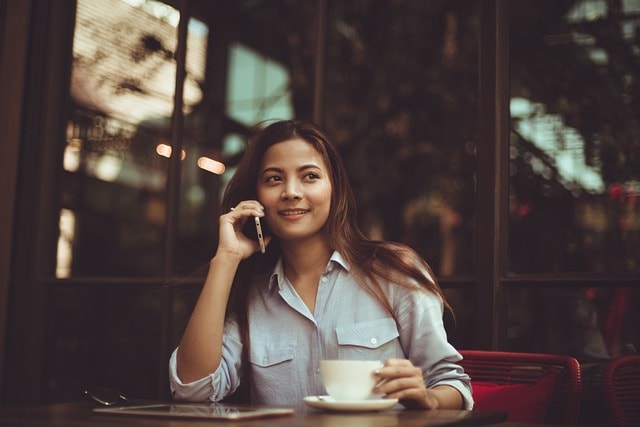 A woman calling via smartphone.